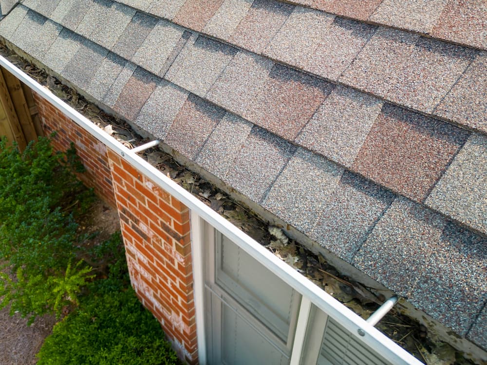 how often to clean gutters